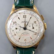 A gentleman's 1950's? 18k Norina chronograph manual wind wrist watch, on later strap.CONDITION: Case