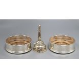 A pair of bottle coasters with beaded rims and turned hardwood bases, London 1991, width 14cm and