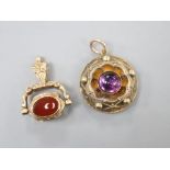 A Victorian yellow metal and cabochon amethyst set pendant, 20mm and a modern 9ct gold and gem set