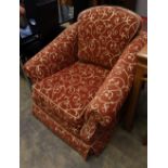 A pair of large modern armchairs, with cream scroll on rust ground upholstery, W.101cm