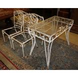 A glass top painted wrought iron garden table, W.91cm, D.50cm, H.74cm together with four chairs (