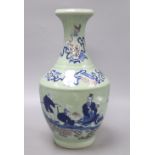 A Chinese celadon and underglaze blue vase, height 40cmCONDITION: There are surface scratches to the