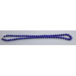 A lapis lazuli circular bead necklace, 92cm.