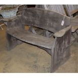 A rustic wood garden bench, W.120cm, D.43cm, H.74cm