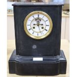 A Victorian black slate mantel clock