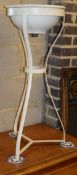 A painted wrought iron wash stand, H.84cm