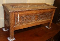 A late Victorian small carved oak coffer, W.89cm, D.34cm, H.43cm