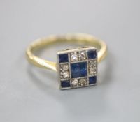 A 1920's 18ct and Pt, sapphire and diamond set tablet ring, size H, gross 2.3 grams.CONDITION: No