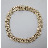 A yellow metal double link bracelet (tests as 9ct gold), 16.5 grams.