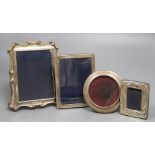 Four assorted modern silver mounted photograph frames, largest 18.5cm.