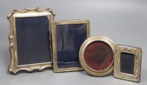 Four assorted modern silver mounted photograph frames, largest 18.5cm.