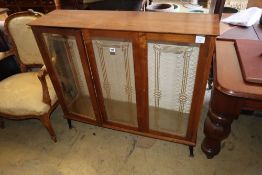 A 1950's walnut display cabinet, W.107cm, H.94cm