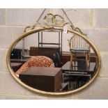 An Edwardian oval giltwood and gesso wall mirror (a.f.), W.92cm, H.76cm