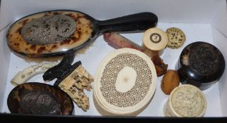 Three Oriental ivory jars and covers, other ivory carvings and a tortoiseshell part dressing table