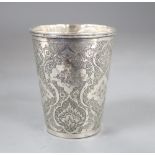 A Persian engraved white metal beaker, 71mm, 100 grams.