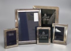 Five assorted modern silver mounted photograph frames, largest 21.2cm.