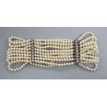 A multi strand simulated pearl and white paste set choker necklace, 32.7cm.