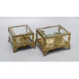 A pair of Continental gilt glazed caskets, widest 14cm height 10cm