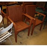 A set of six stained teak garden elbow chair
