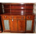 A Regency style satinwood banded mahogany breakfront secretaire cabinet, W.152cm, D.50cm, H.138cm