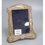 An Edwardian Art Nouveau silver mounted photograph frame, Birmingham, 1904, 21.5cm.