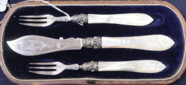 A silver and mother of pearl-handled three-piece butter/pickle set, Birmingham 1864, maker George