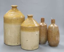 A pair of stoneware vessels, a G. Crease & Son Wine and Spirit Merchants vessel, and a G & C A