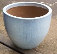 A large white glaze garden planter, 72cm diameter