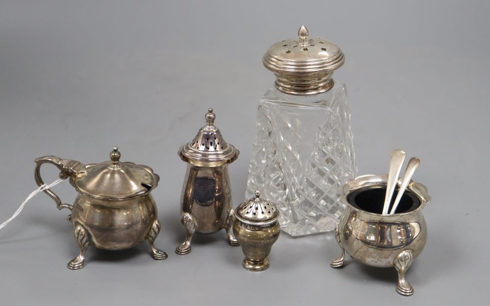 A modern silver three piece condiment set by Elkington & Co, one other silver condiment and a silver