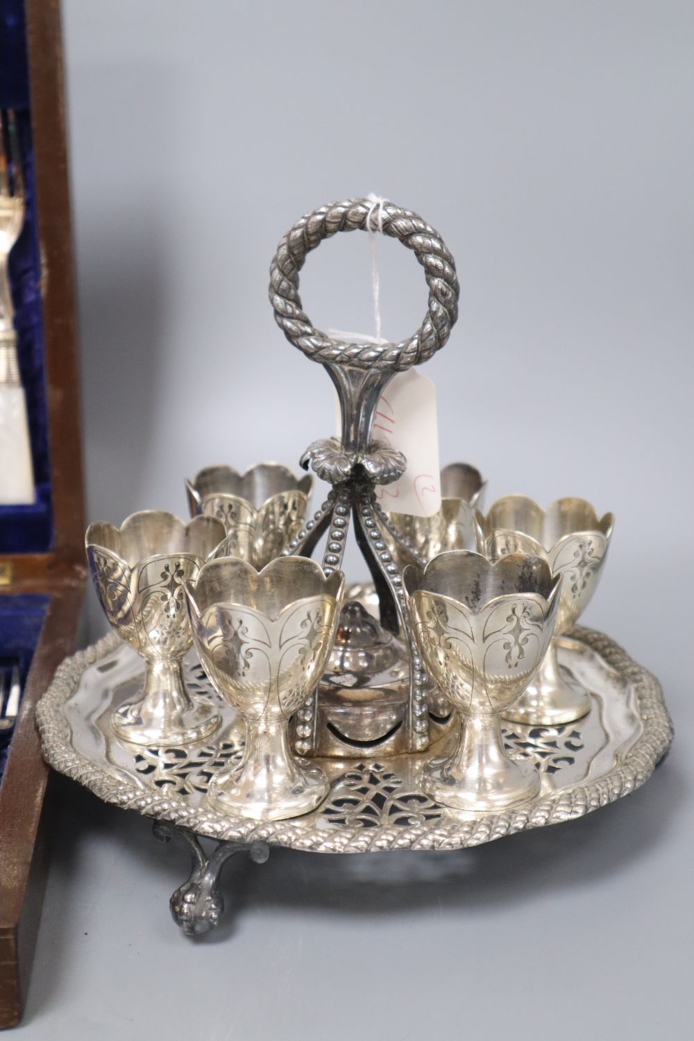 A Victorian electroplate egg cruet stand and cased set of fruit knives and forks - Image 2 of 4