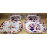 Three graduated Copeland and Garrett meat platters and an ironstone meat platter, widest 53cm