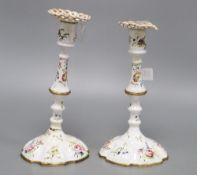 A pair of late 18th century South Staffordshire enamelled candlesticks, height 24cm