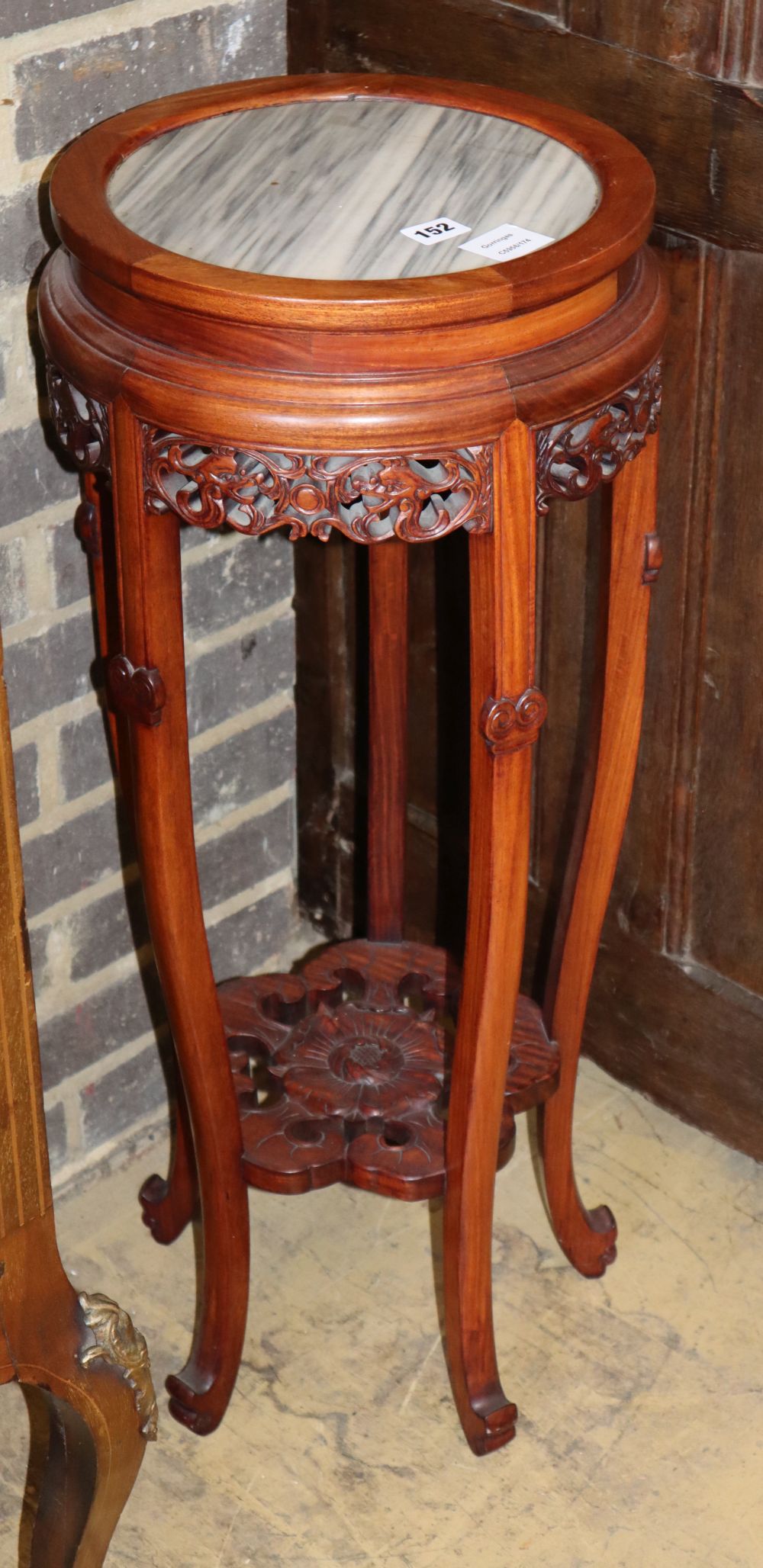 A Chinese hardwood stand with marble inset top, H.82cm, D.33cm