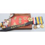 A Bosuns whistle, a 1st World War trio and 2nd World War Medals, badges etcCONDITION: Pte. G.