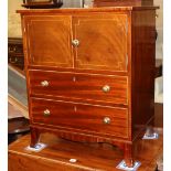 A Regency inlaid mahogany cabinet, fitted doors and two drawers, (formerly a commode chest), W.61cm