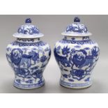 A pair of Chinese blue and white 'dragon' vases, height 26cmCONDITION: We believe these to be modern