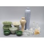 Five Oriental celadon type bowls or vases and two crackleware vases and five glass condiments,