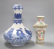 A Chinese famille rose vase and a Chinese blue and white vase (2)CONDITION: The famille rose has a