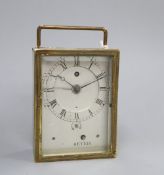 A 19th century French brass alarm timepiece, marked Reveil