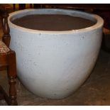 A large white glazed circular garden planter, 70cm diameter, H.55cm