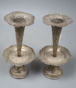 A pair of early 20th century Indian pierced white metal spill vases with drip pans?, 22.2cm,