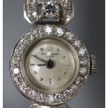 A lady's mid 20th century 585 white metal and diamond set Baume & Mercier manual wind cocktail