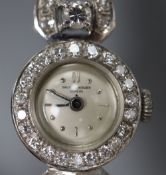 A lady's mid 20th century 585 white metal and diamond set Baume & Mercier manual wind cocktail