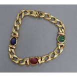 A modern 750 yellow metal and cabochon, ruby, sapphire and emerald set curblink bracelet,(stones