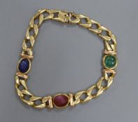 A modern 750 yellow metal and cabochon, ruby, sapphire and emerald set curblink bracelet,(stones