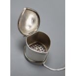 An 18ct century white metal nutmeg grater, with engraved initials, unmarked, 28mm.CONDITION: Hinge