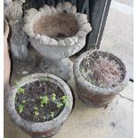 A pair of reconstituted stone garden planters together with a pair of larger campana garden urns,