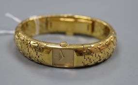 A lady's gilt stainless steel Christian Dior bracelet watch.