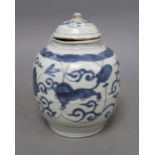A Chinese Late Ming blue and white 'lion and lotus' jar and cover, overall height 17.5cm, restored