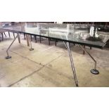 A Norman Foster Techno Nomos glass top table, W.220cm, D.100cm, H.71cm